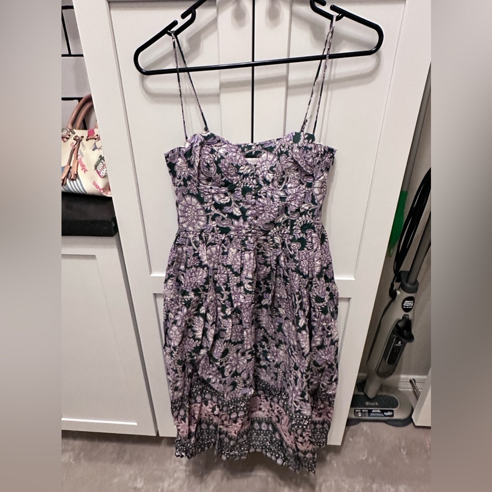 Sleeveless midi dress with pockets